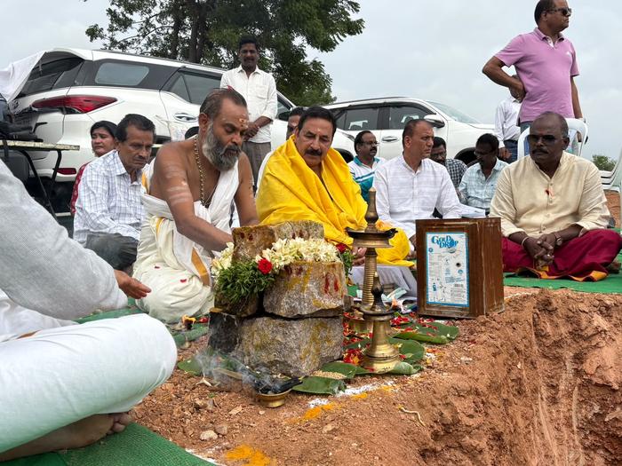 Priest performing rituals at the foundation stone